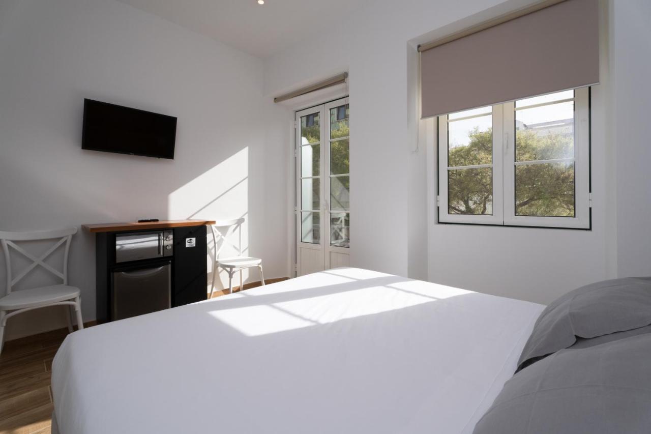 Alameda Guesthouse By Boutique Taipas Garagem Para Motos ปอร์ติเมา ภายนอก รูปภาพ